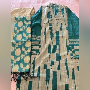 Brand new shalwar kameez from cross stitch.